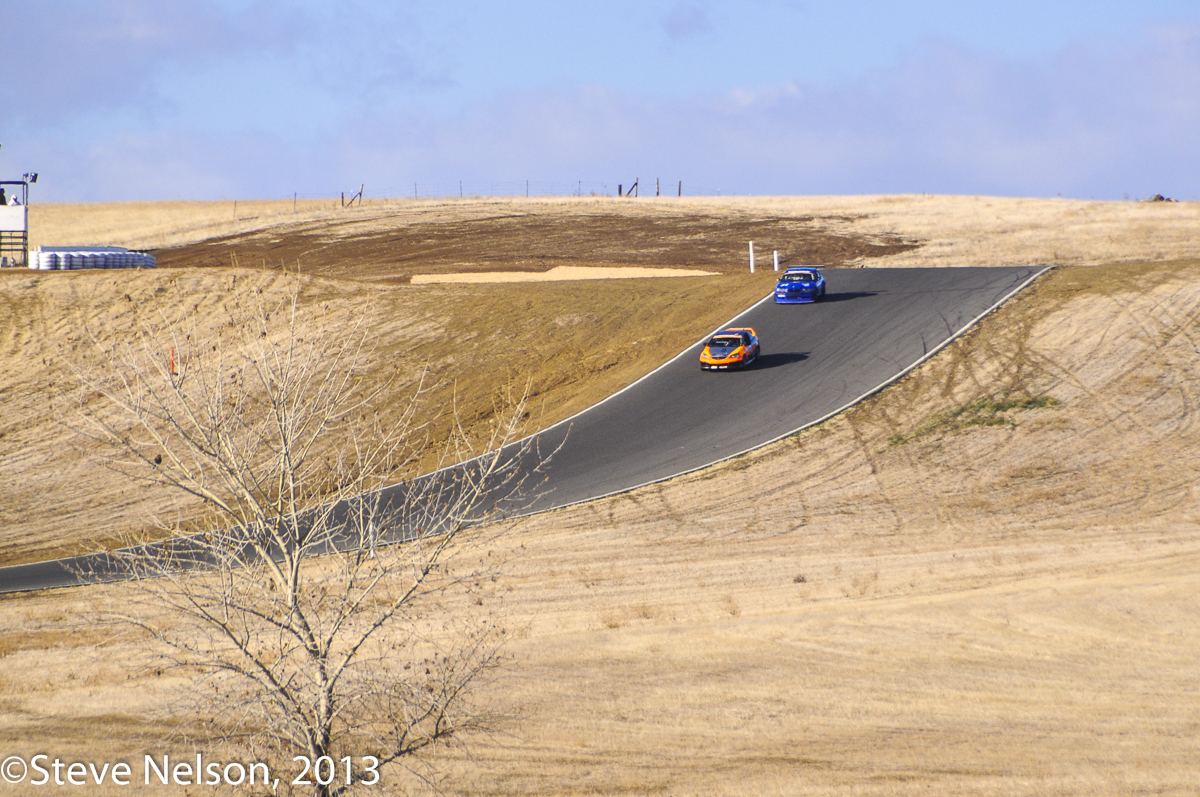 Thunderhills Indeed. The Fantasy Junction Acura heads downhill on the back portion of the course. Despite some cloudy periods, there was no natural thunder in the cold, dry hills.