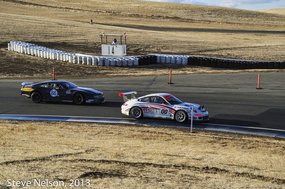 Old Time GT Racing. A tube frame Camaro is dicing with the Flying Lizard run Porsche. No. 86 was a short-track racer converted to road courses and was fast in between long bouts of endless problems. The Pierre Ehret driven Porsche was the 2012 winner and led again for several hours before retiring at half-distance with a broken gearbox.