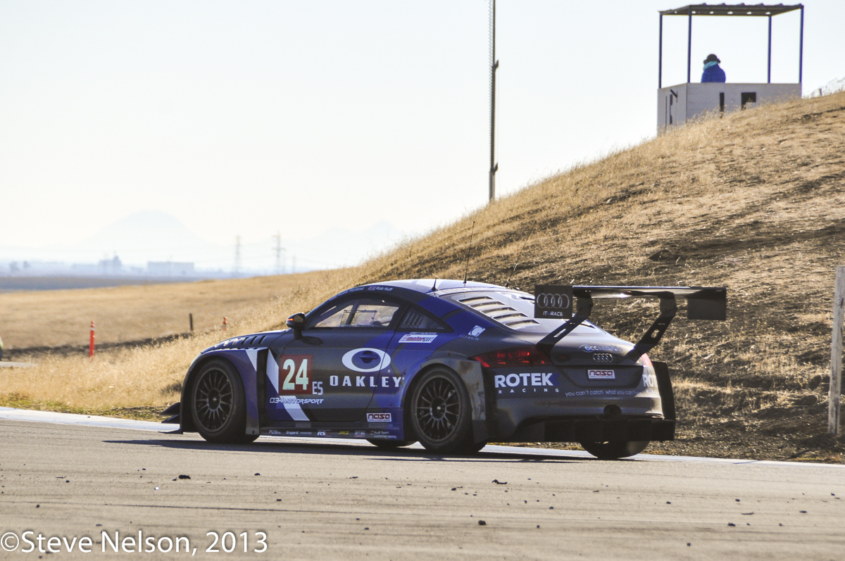 Detritus. It’s a classic endurance racing scene. The winner charges through a battlefield of debris. Seen across the Sacramento River valley are the distant foothills of the Sierra Nevada range. 