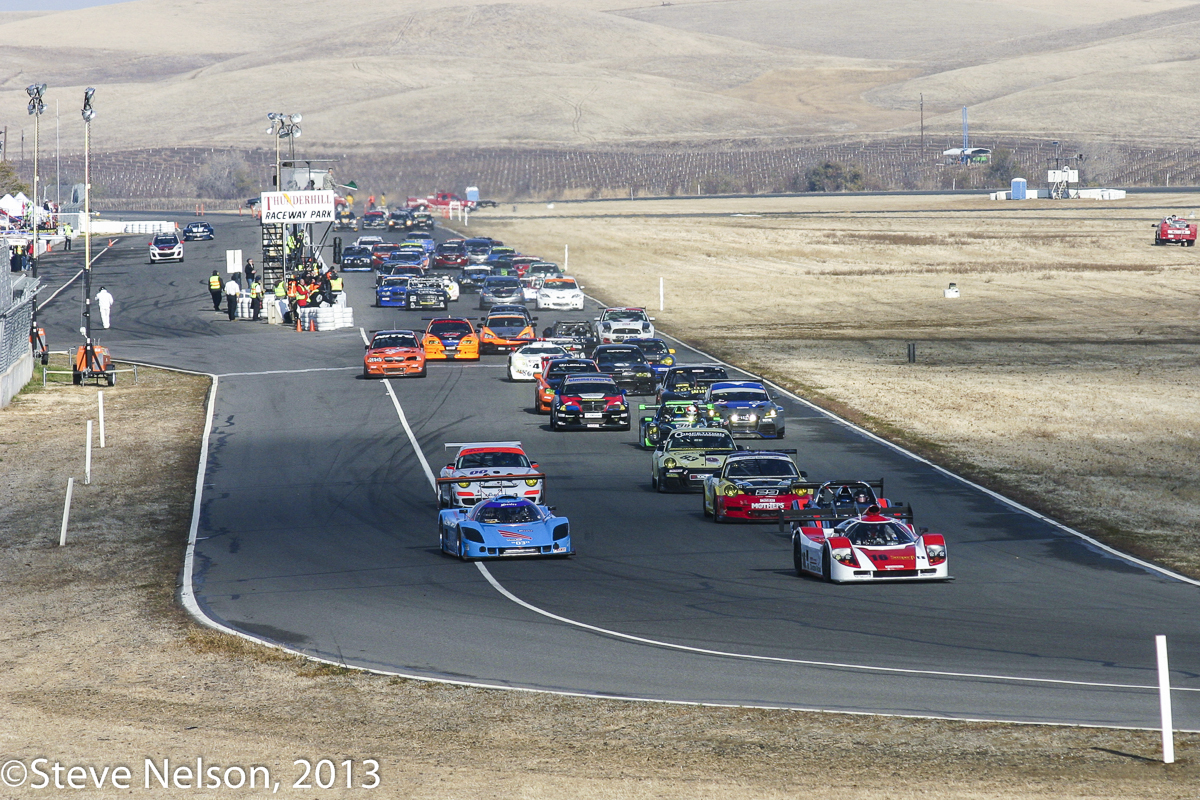 More or Less Equals.  Three V8-powered prototypes lead a trio of Porsches, representing the top of the grid at the start. Behind them is the eventual class winning Radical and the overall winning Audi.